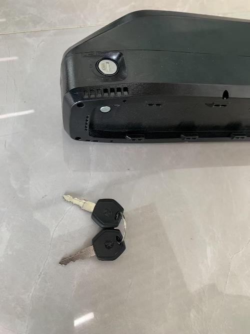 The key for battery of ebike view 5